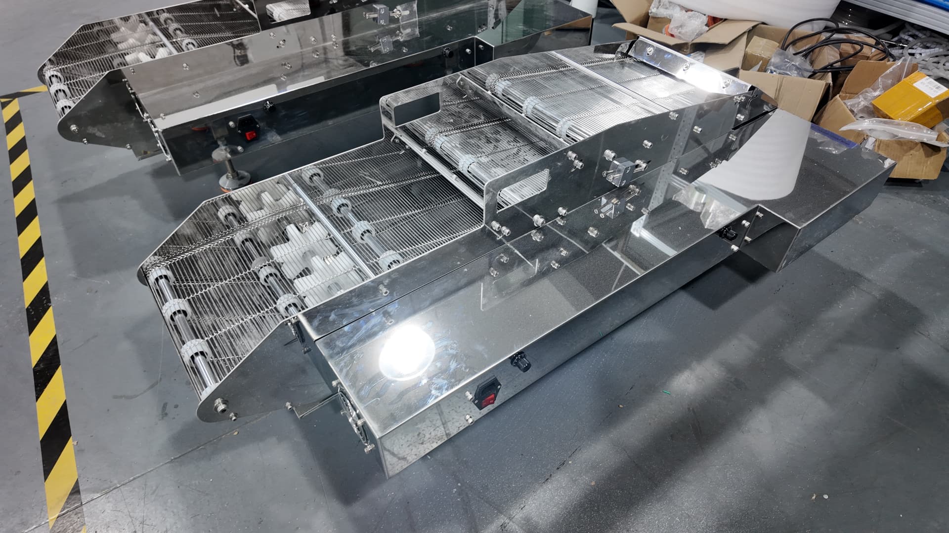The Glue/Kief Coater and infeed conveyor on the shop floor